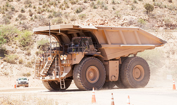 Caterpillar 793B Trucks crossing US 191, Freeport-McMoran Copper & Gold, Morenci, Arizona