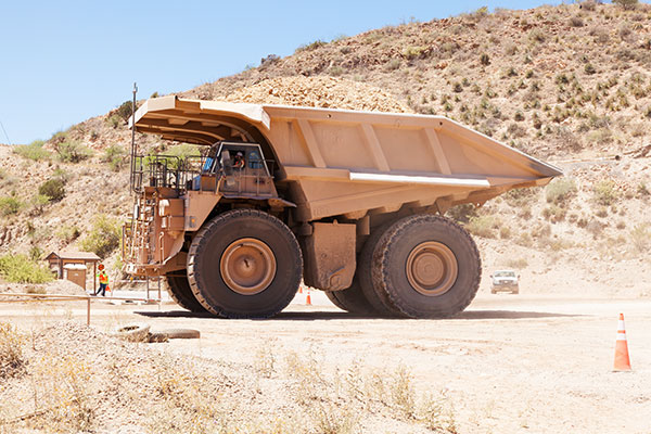 Caterpillar 793B Trucks crossing US 191, Freeport-McMoran Copper & Gold, Morenci, Arizona