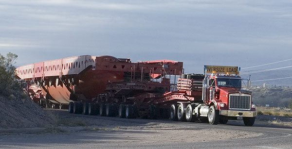 Trucks Hauling Large Autoclave