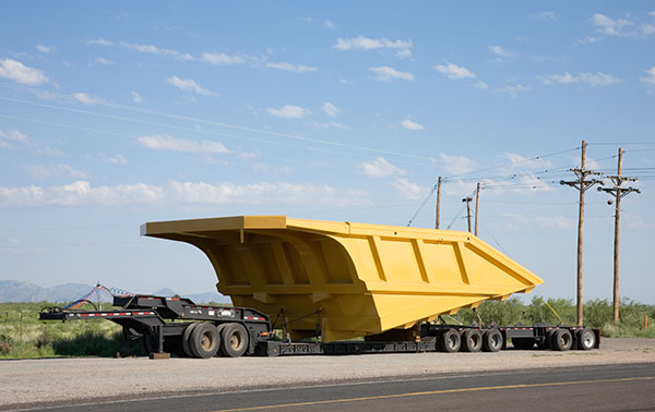 Mine truck bed on truck trailer
