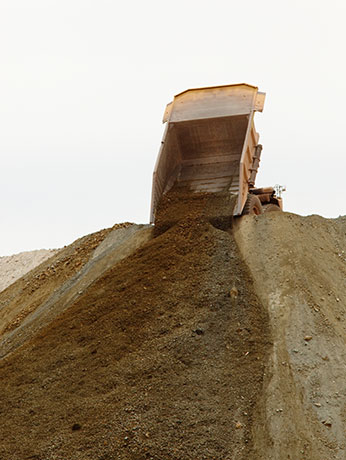 Mine Truck dumping Waste 