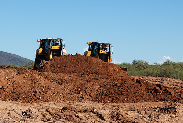 Caterpillar D8T dozers pushing dirt  Arizona