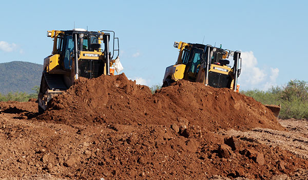 Caterpillar D8T dozers pushing dirt  Arizona