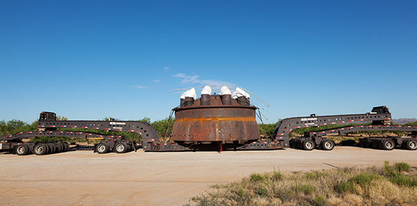 Truck with oversize load  on lowboy trailer  Arizona