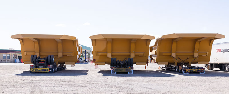 Haul Truck Beds on Lowboy Trailers