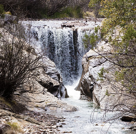 Water flowing over Dam at John Hand Campground, Cave Creek, Chiricahua Mountains, Arizona