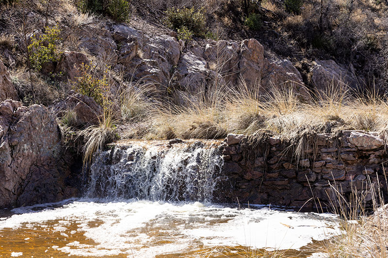 Water flowing over Dam in Clanton Draw, Hidalgo County, New Mexico